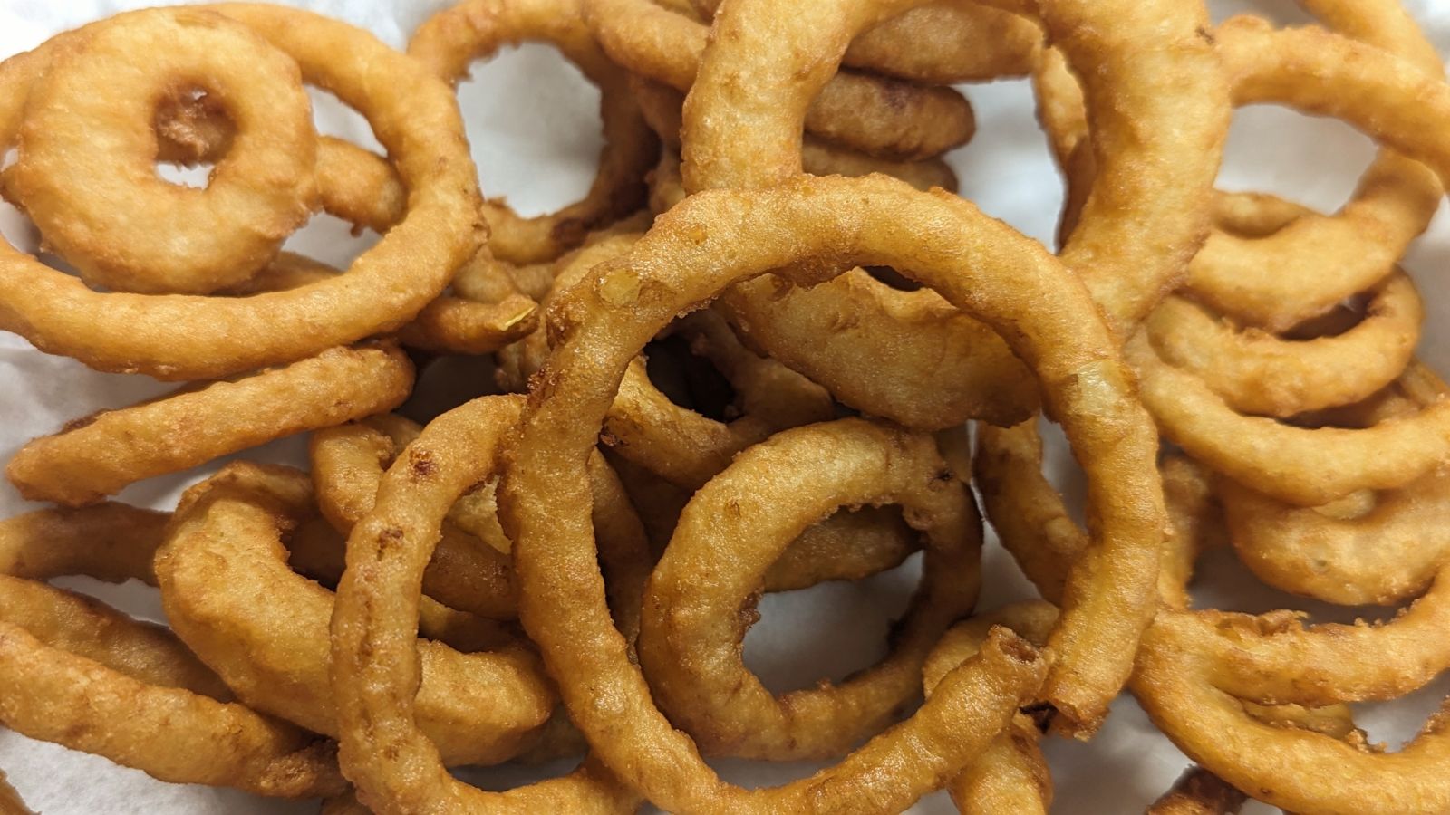 Menu page image of a side of onion rings